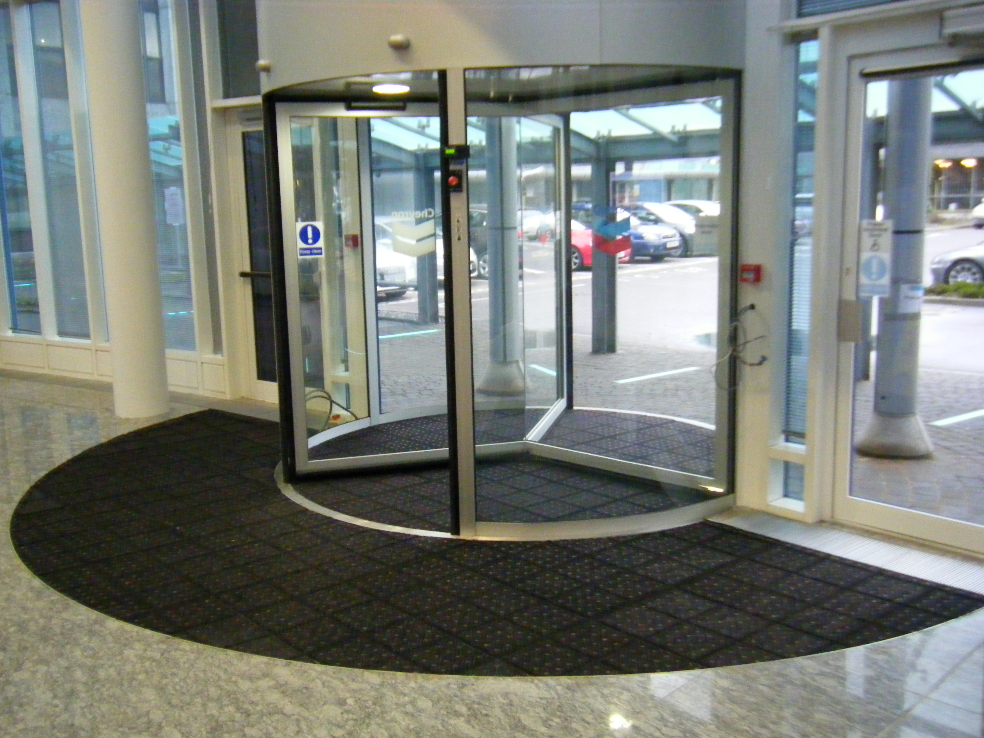 Surewalk Diamond matwell entrance matting system Revolving Door